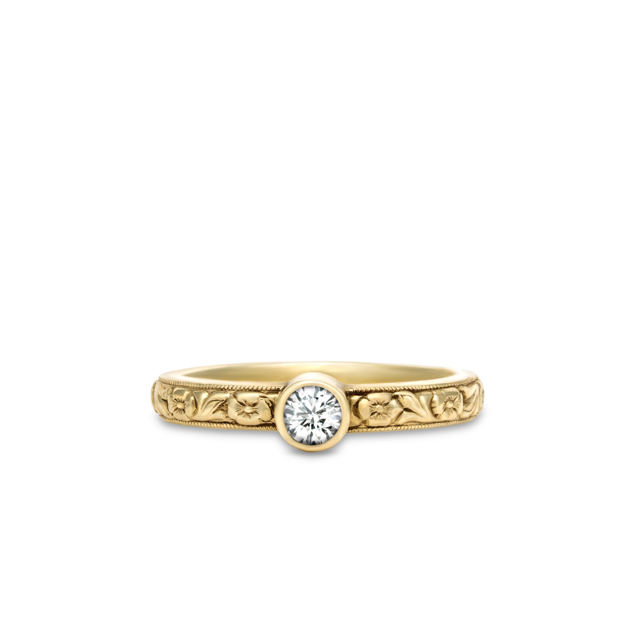 Gold ring with diamond on a white background